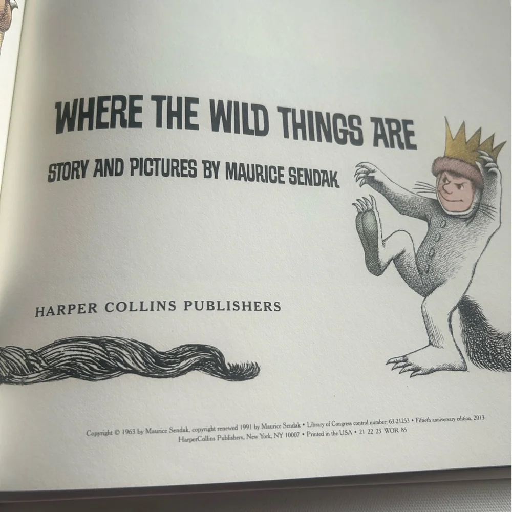 Set of 2 Where the Wild things Are Book & Who wants a cheap rhinoceros Hardback